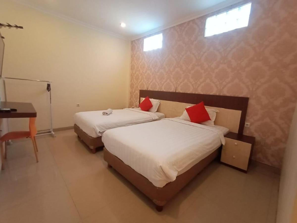Oyo 90473 Gowin Hotel Кута Экстерьер фото