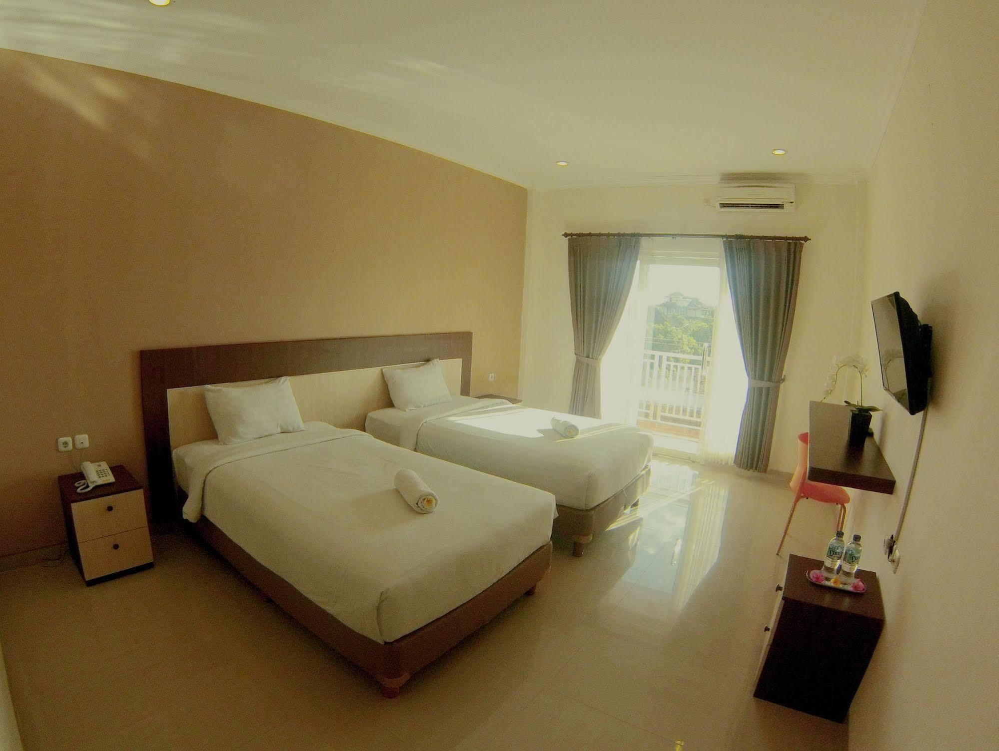 Oyo 90473 Gowin Hotel Кута Экстерьер фото