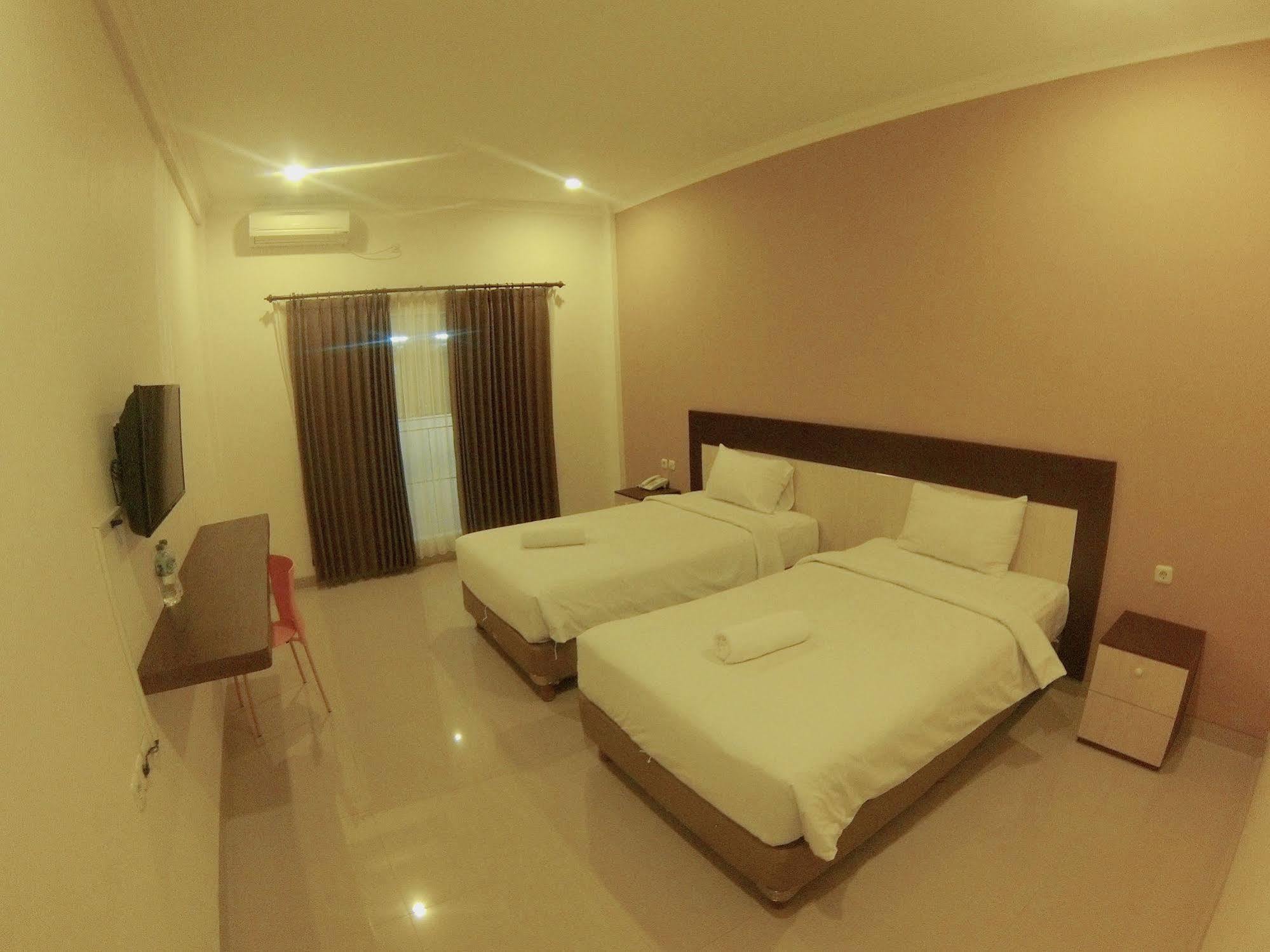 Oyo 90473 Gowin Hotel Кута Экстерьер фото